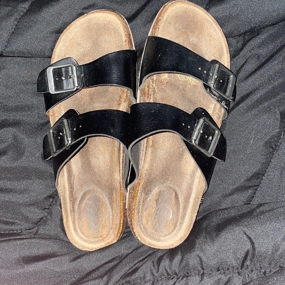 Brown and Black BIRKENSTOCKS.
